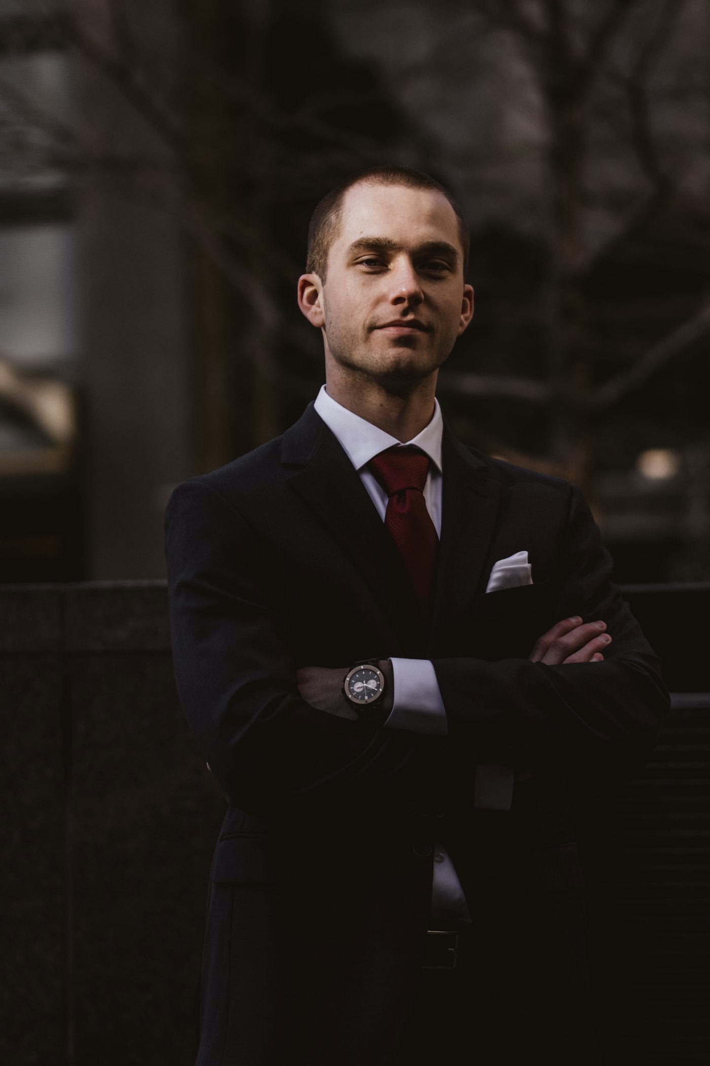 Man in a tailored suit with a polished grooming look