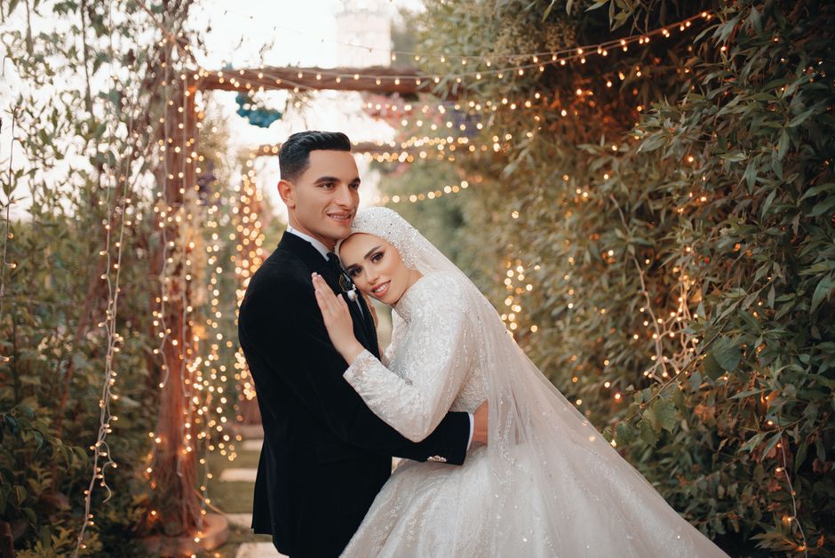 Beautiful couple embracing at an outdoor wedding in Cairo, Egypt.